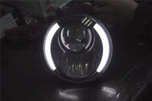 Load image into Gallery viewer, 7&quot; DAYMAKER BLACK Angel Eye built in TURN SIGNALS Projector LED Light Bulb Headlight Motorcycle Harley Blinkers